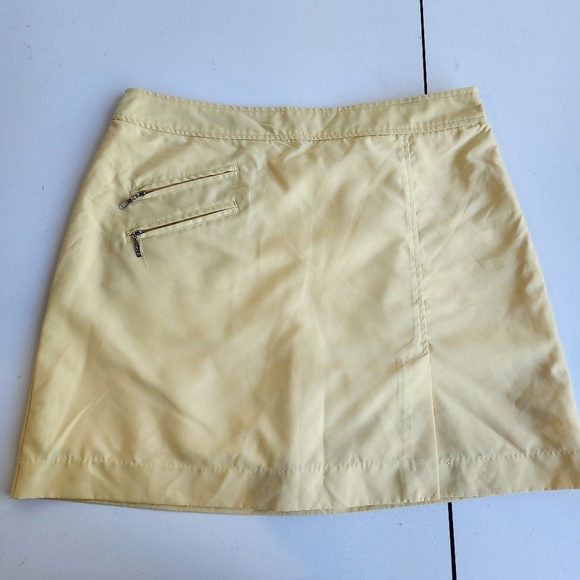 Izod Golf Skort Women's Light Yellow Zip Closure Slash Pockets Cool FX Skirt 10 - Picture 1 of 10